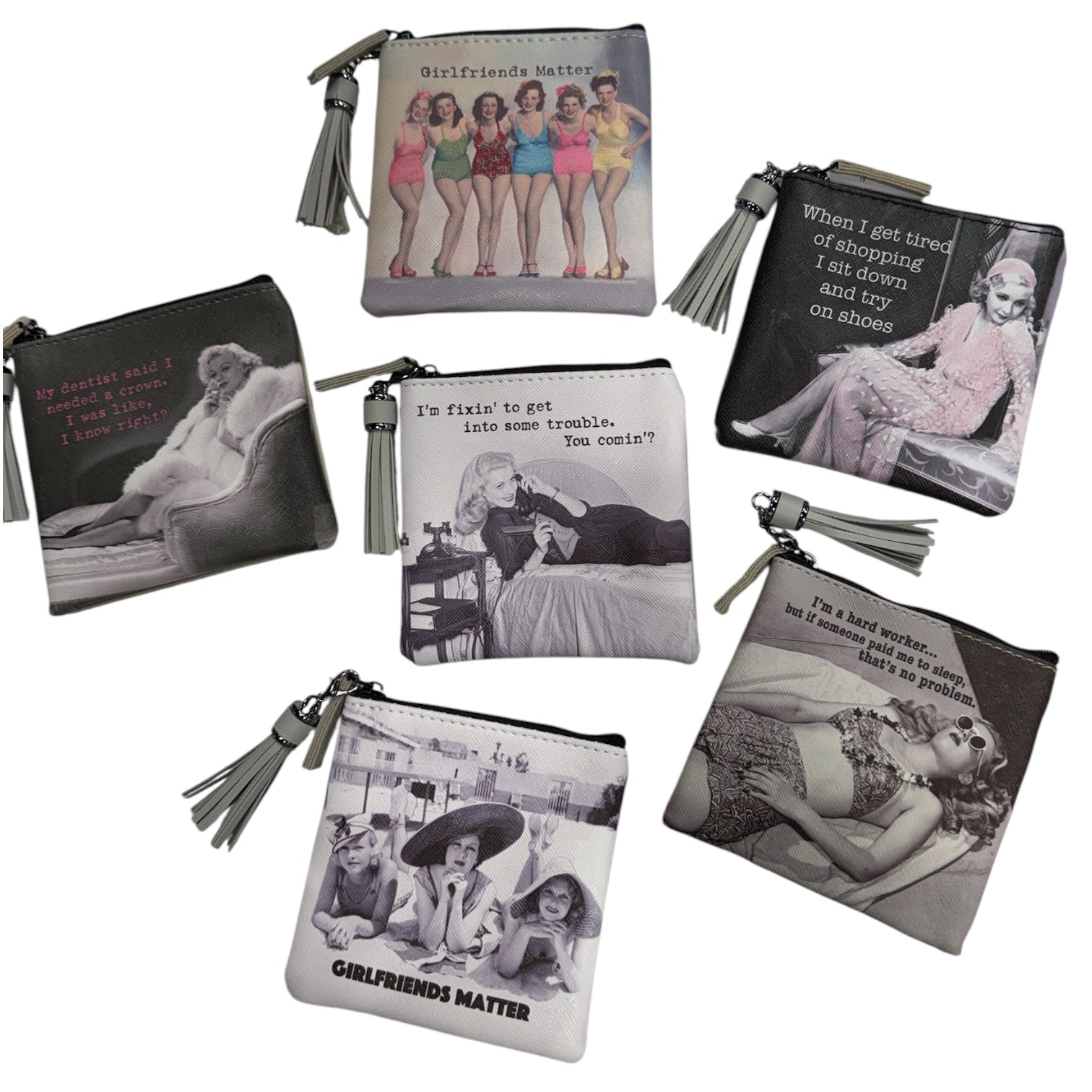 Six zippered pouches with silver-toned metal zippers and gray tassel pulls, each printed with a vintage-style black-and-white or sepia photo of a woman and a quote from the phrase 'Girlfriends Matter.' The pouches are arranged on a plain white background.