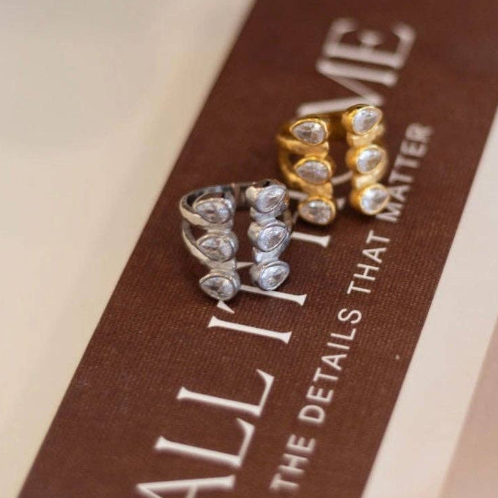 cluster silver, on a brown surface with text.