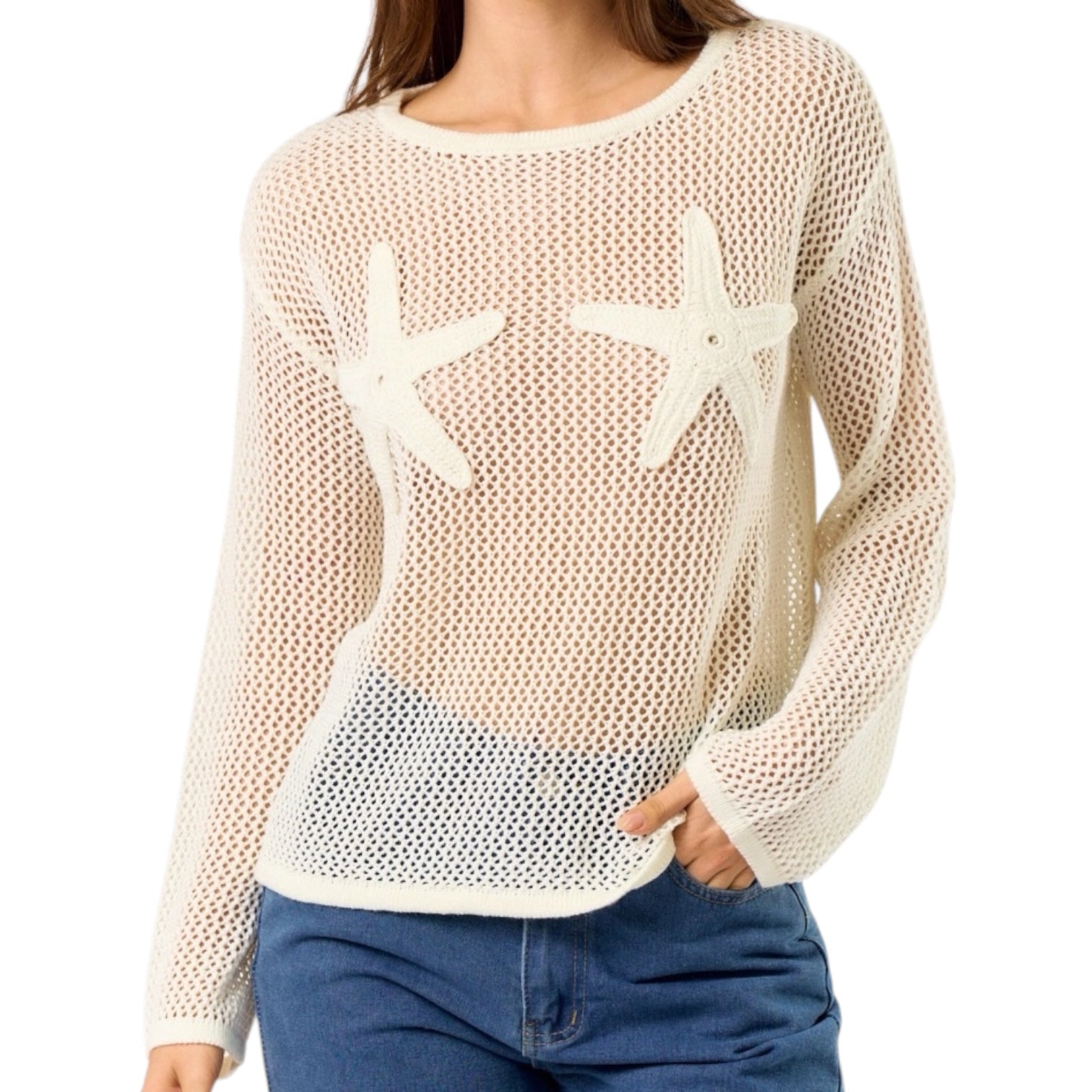 Beige mesh sweater with starfish patterns worn by a person on a white background
