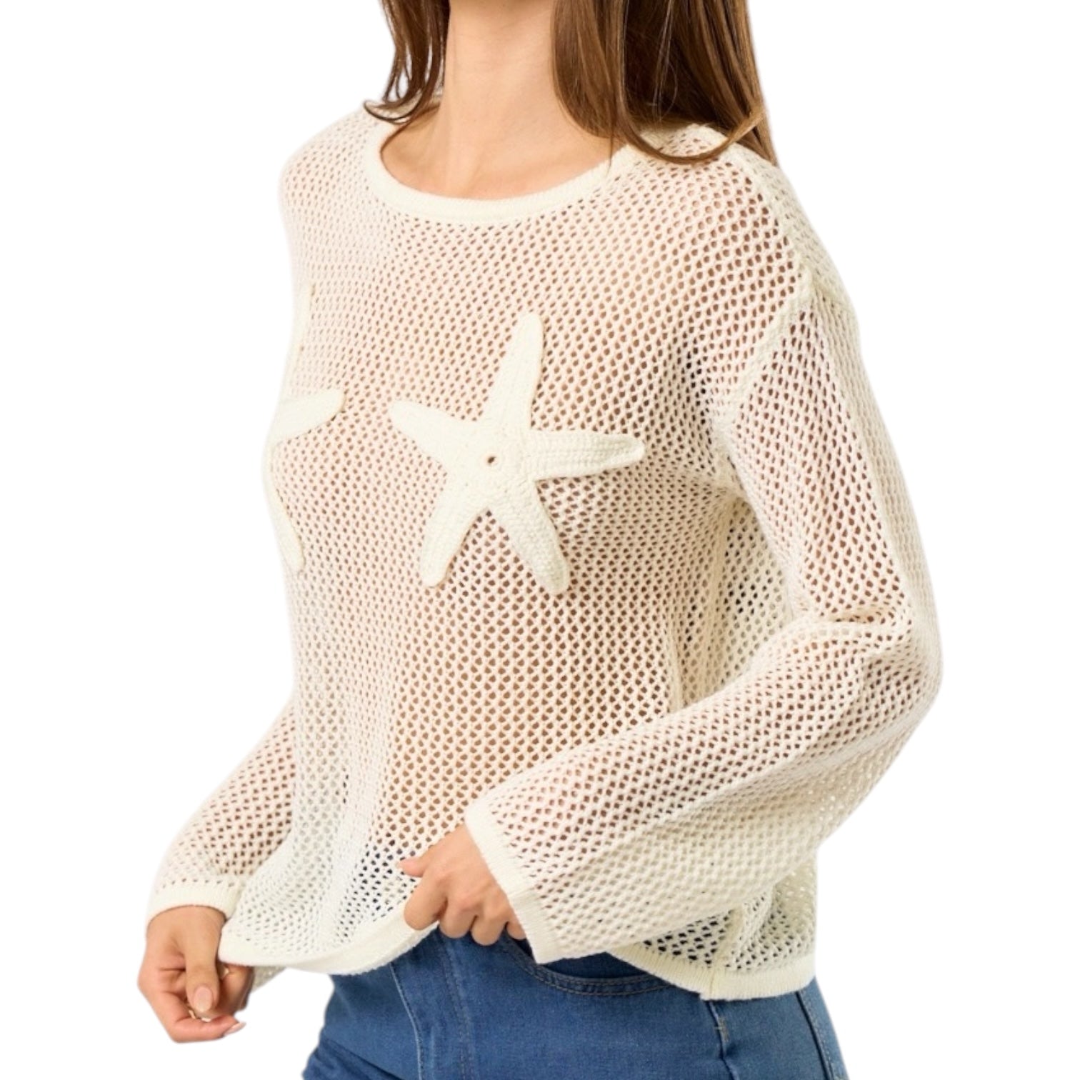 Beige mesh sweater with starfish designs worn by a person on a white background