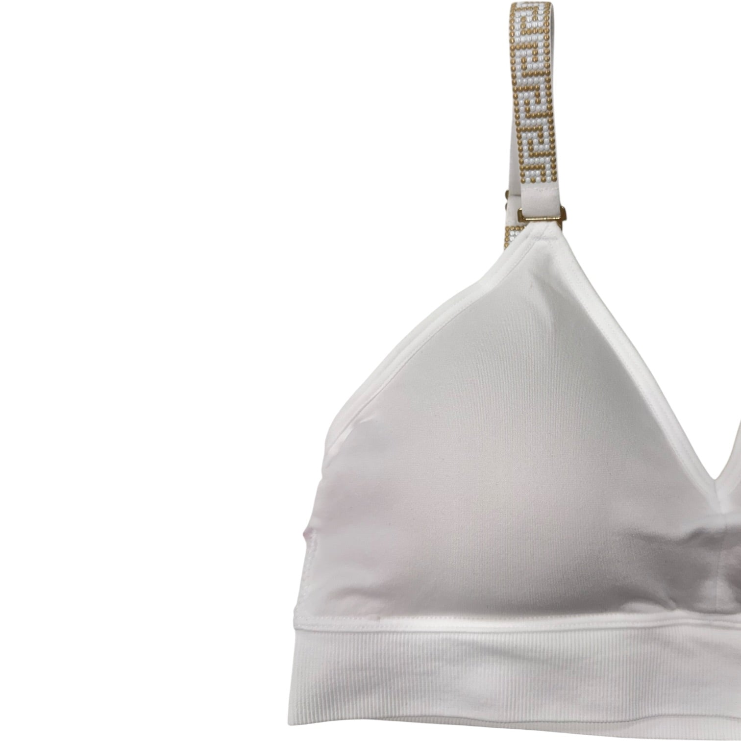 White bra with embellished straps on a white background