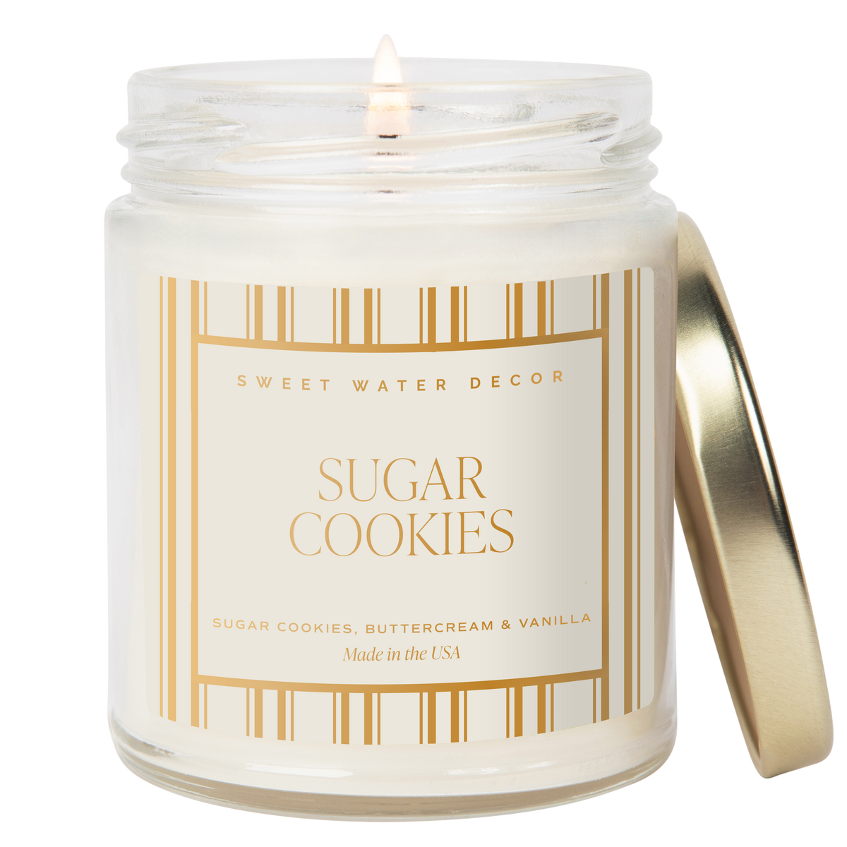 Candle in a jar labeled 'Sugar Cookies' by Sweet Water Decor on a white background
