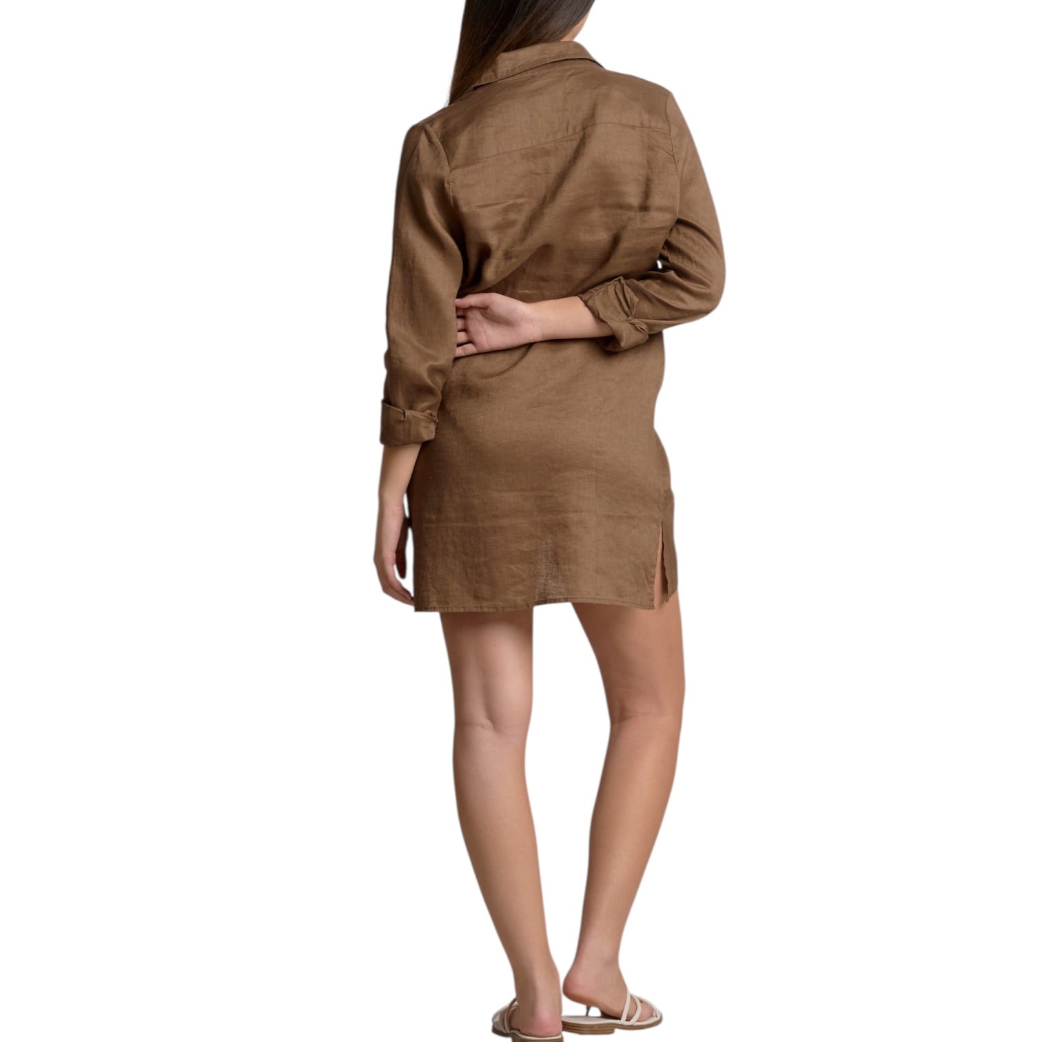 Woman wearing a brown dress on a white background