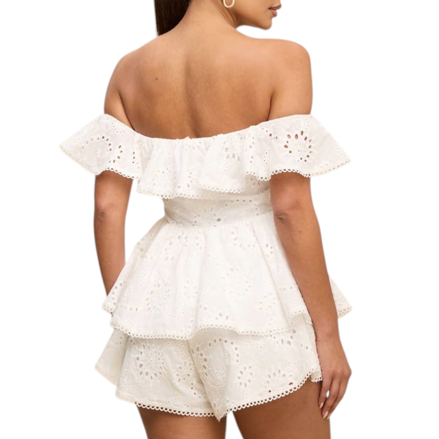 White off-shoulder romper with ruffled details on a white background