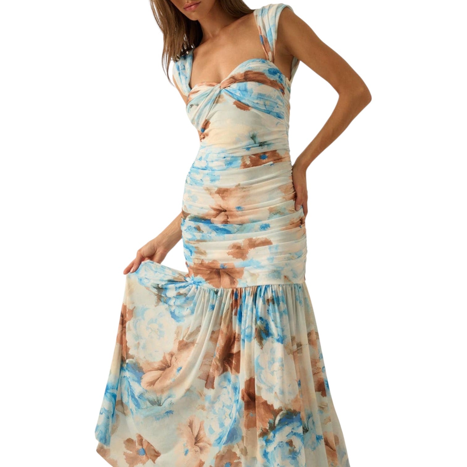 Woman wearing a floral one-shoulder dress on a white background