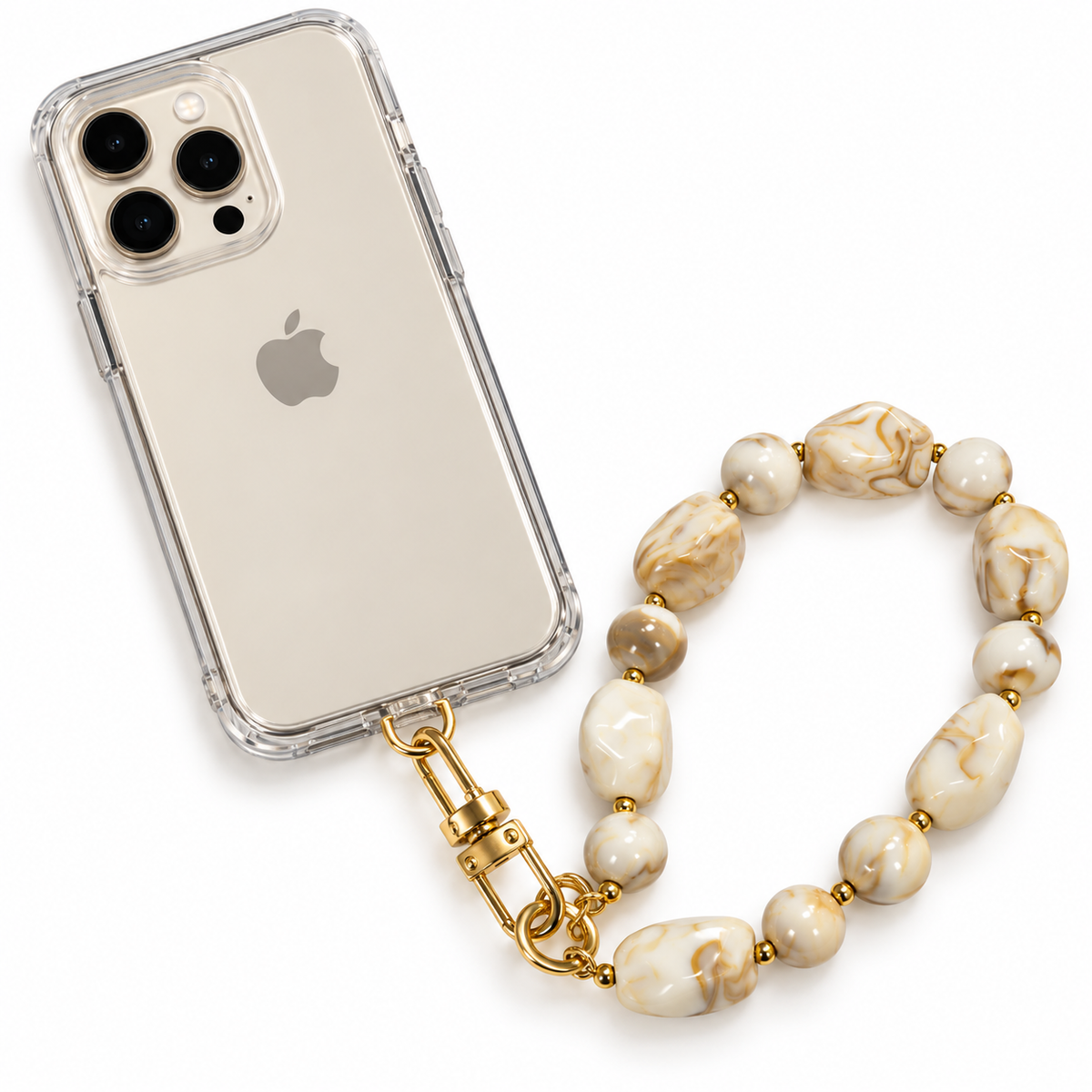 A clear iPhone case with a gold-tone clasp attached to a beaded phone strap made of cream and tan marbled beads separated by small gold spacer beads, shown on a white background.