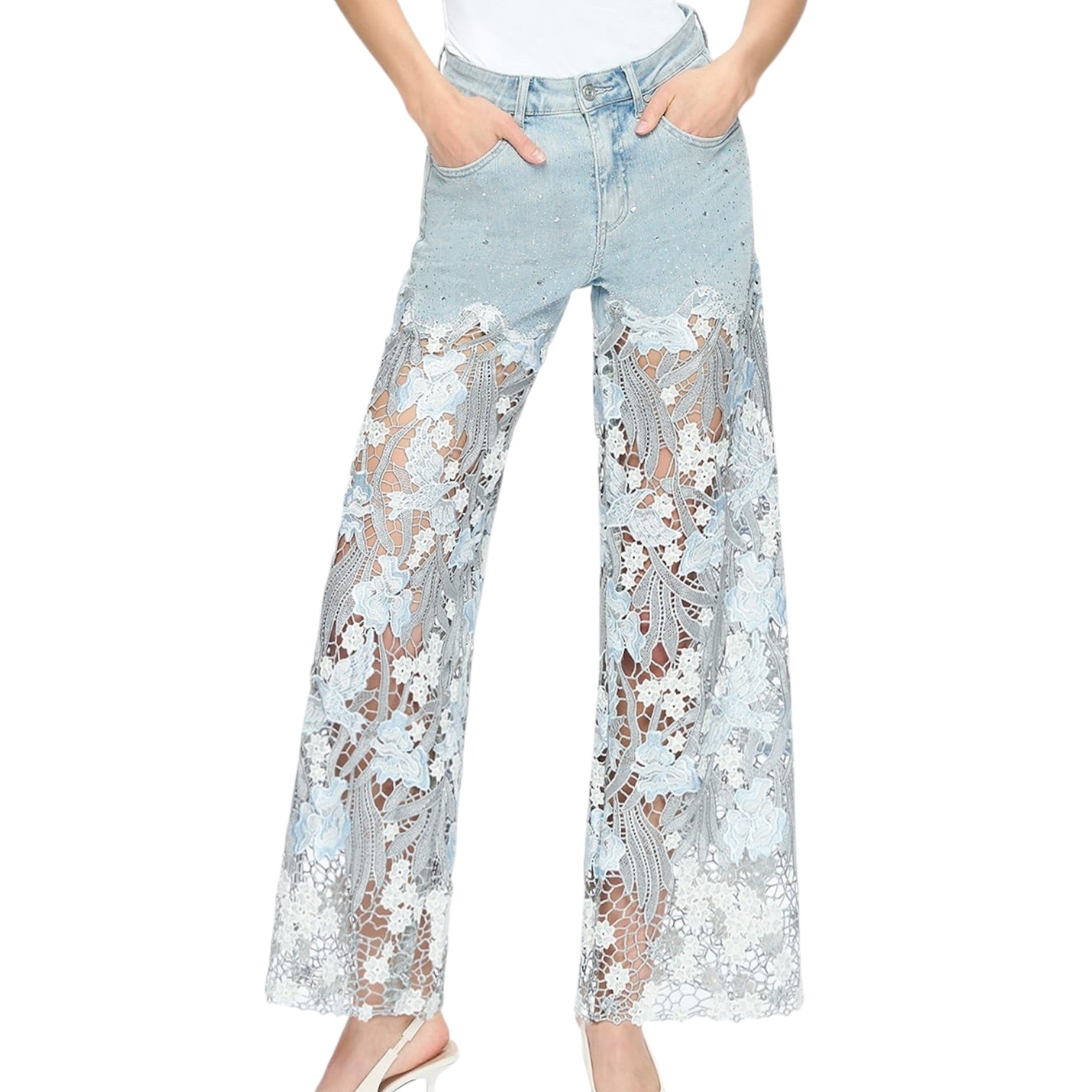Light blue jeans with floral lace overlay worn by a person on a white background