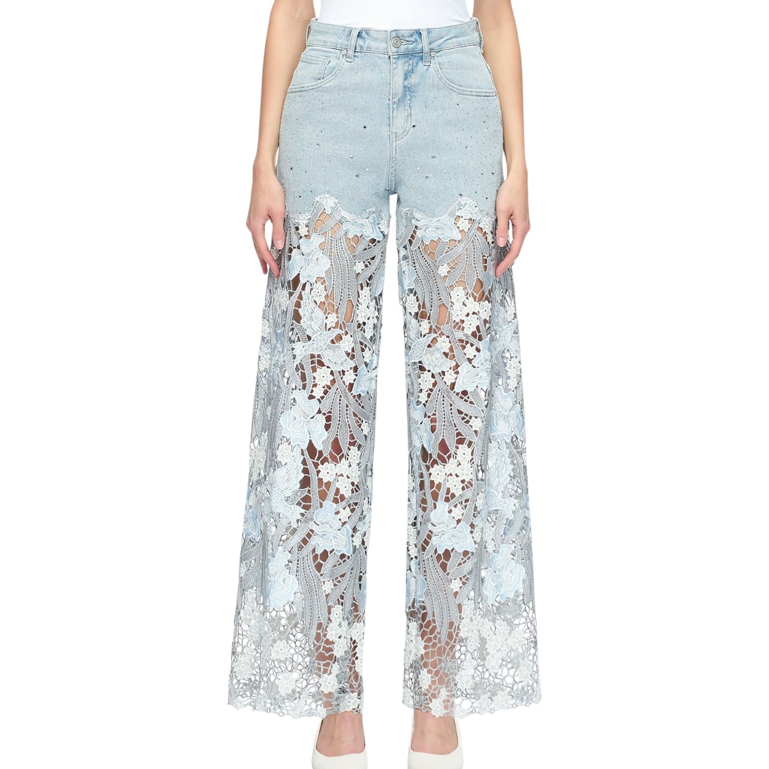 Light blue jeans with floral lace overlay on a white background