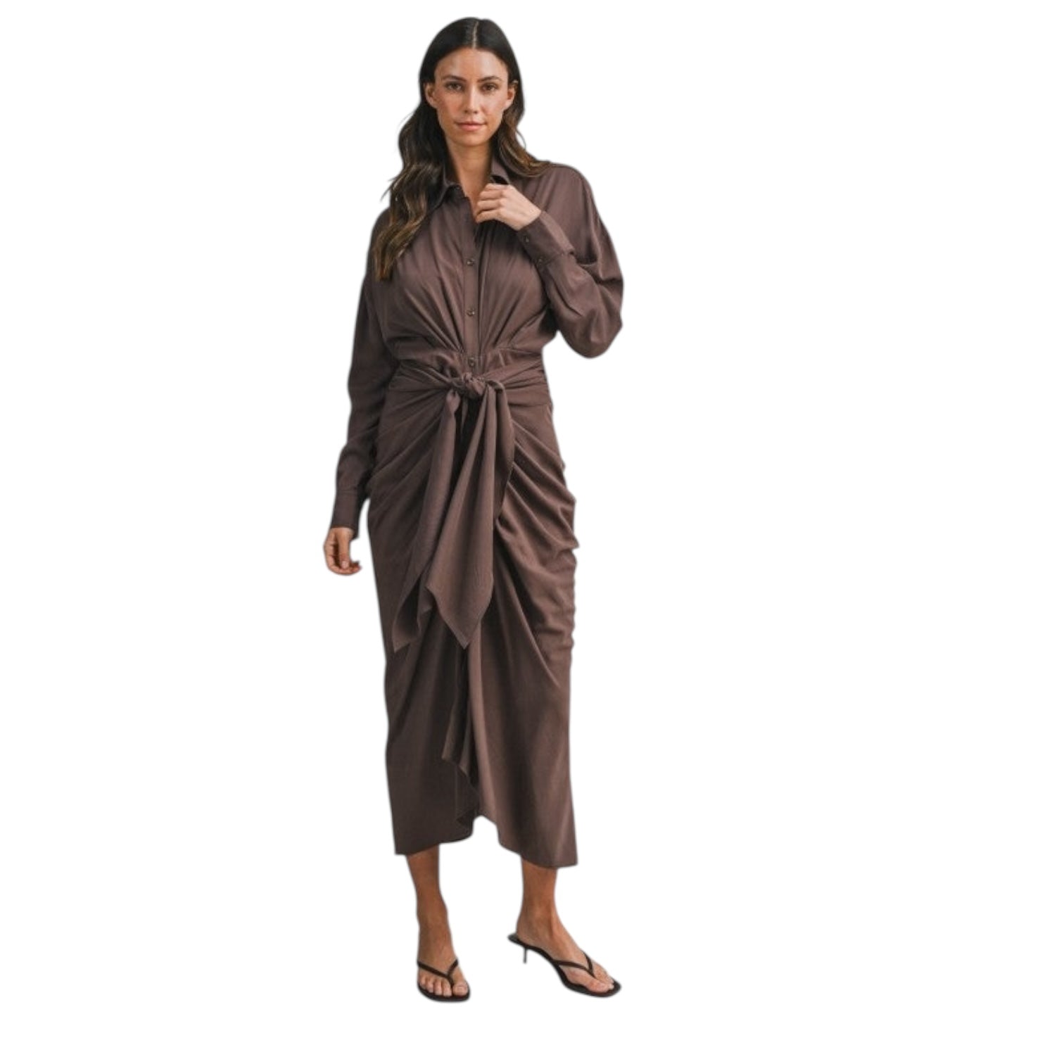 Woman wearing a brown wrap dress on a white background