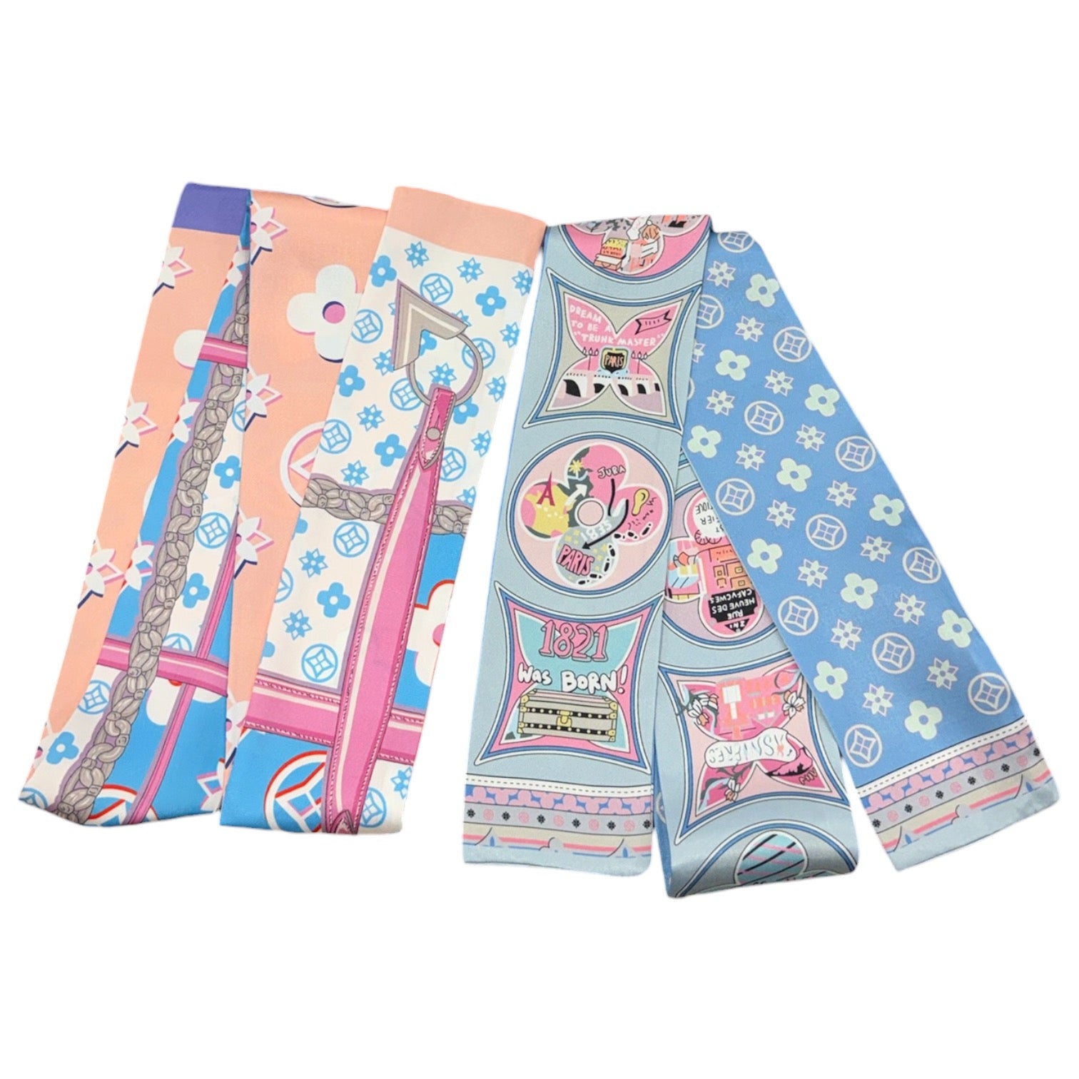 Set of colorful baby rompers with various patterns on a white background