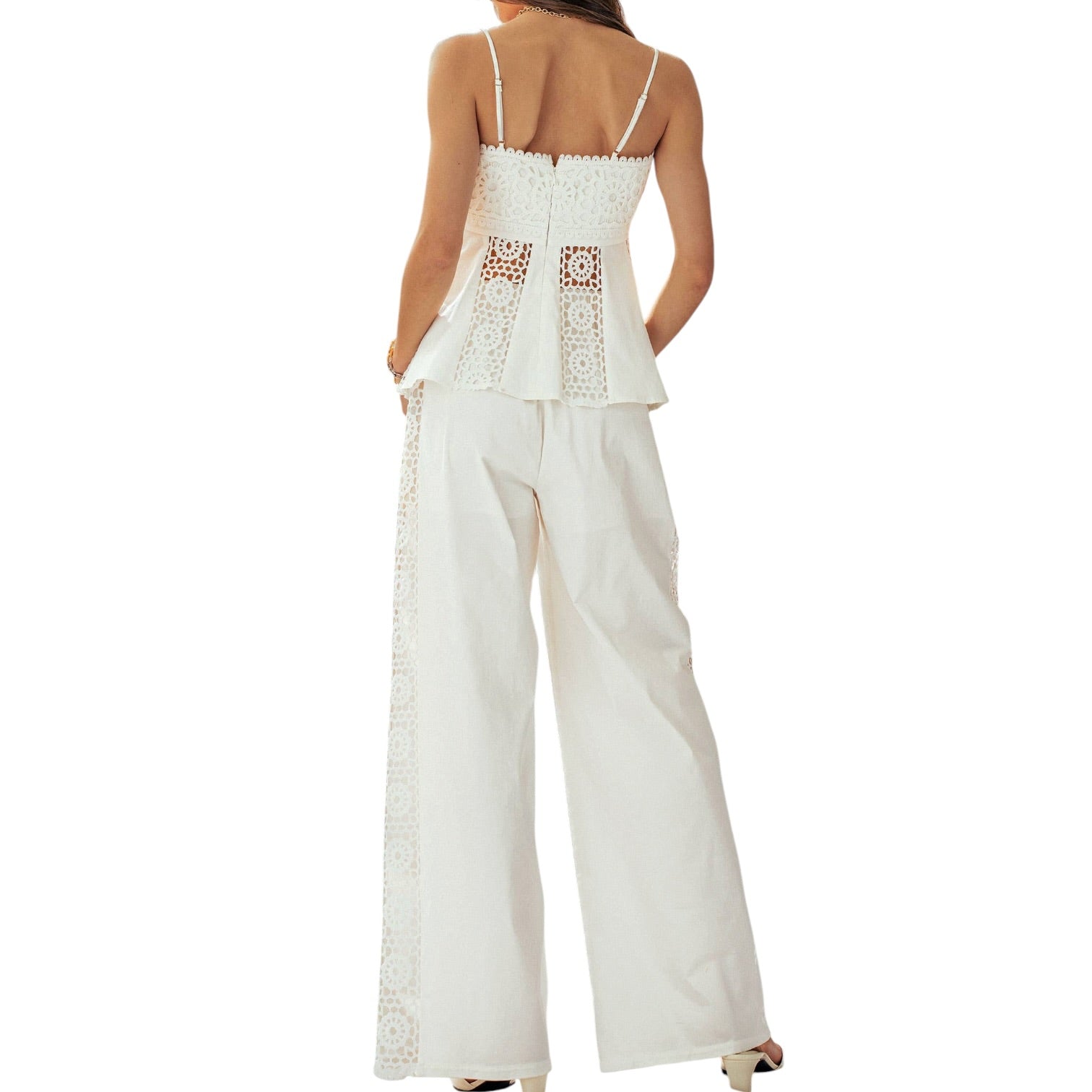 White lace top and wide-leg pants on a white background