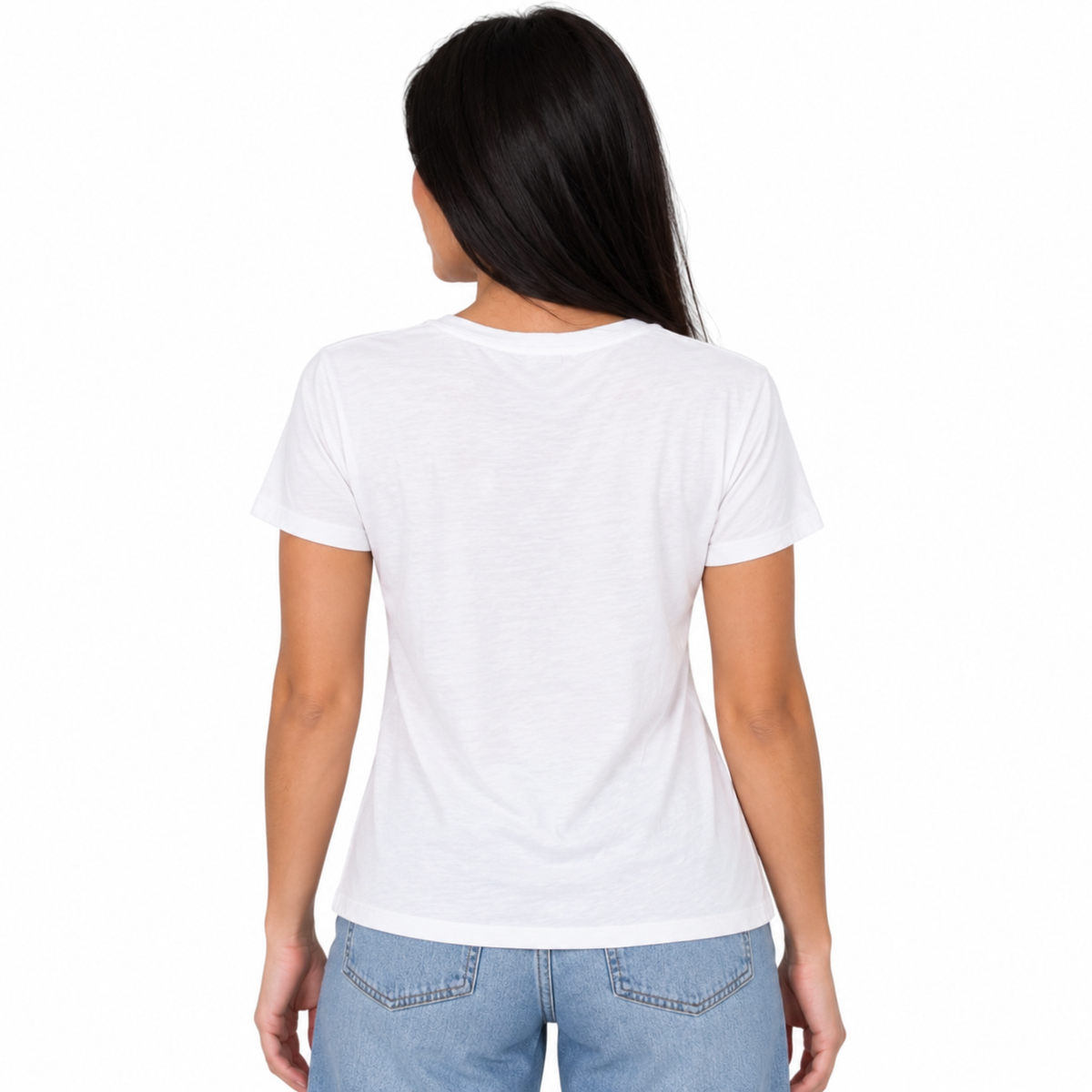 A woman viewed from the back wearing a plain white short-sleeve crewneck t-shirt and light blue jeans, set against a solid white background.