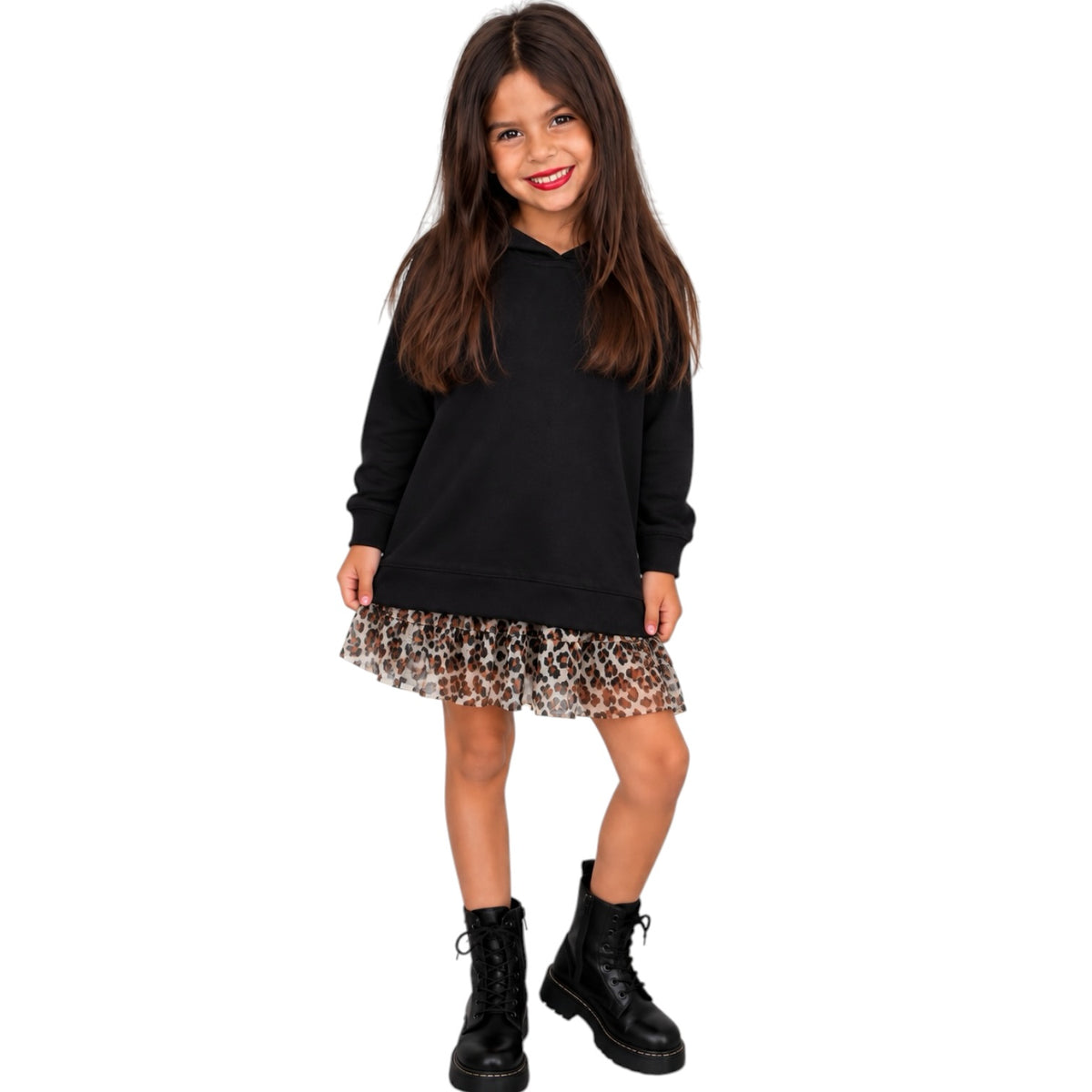 A young girl modeling a black long-sleeve hoodie dress with a leopard-print ruffled skirt and black combat boots, set against a plain white background.