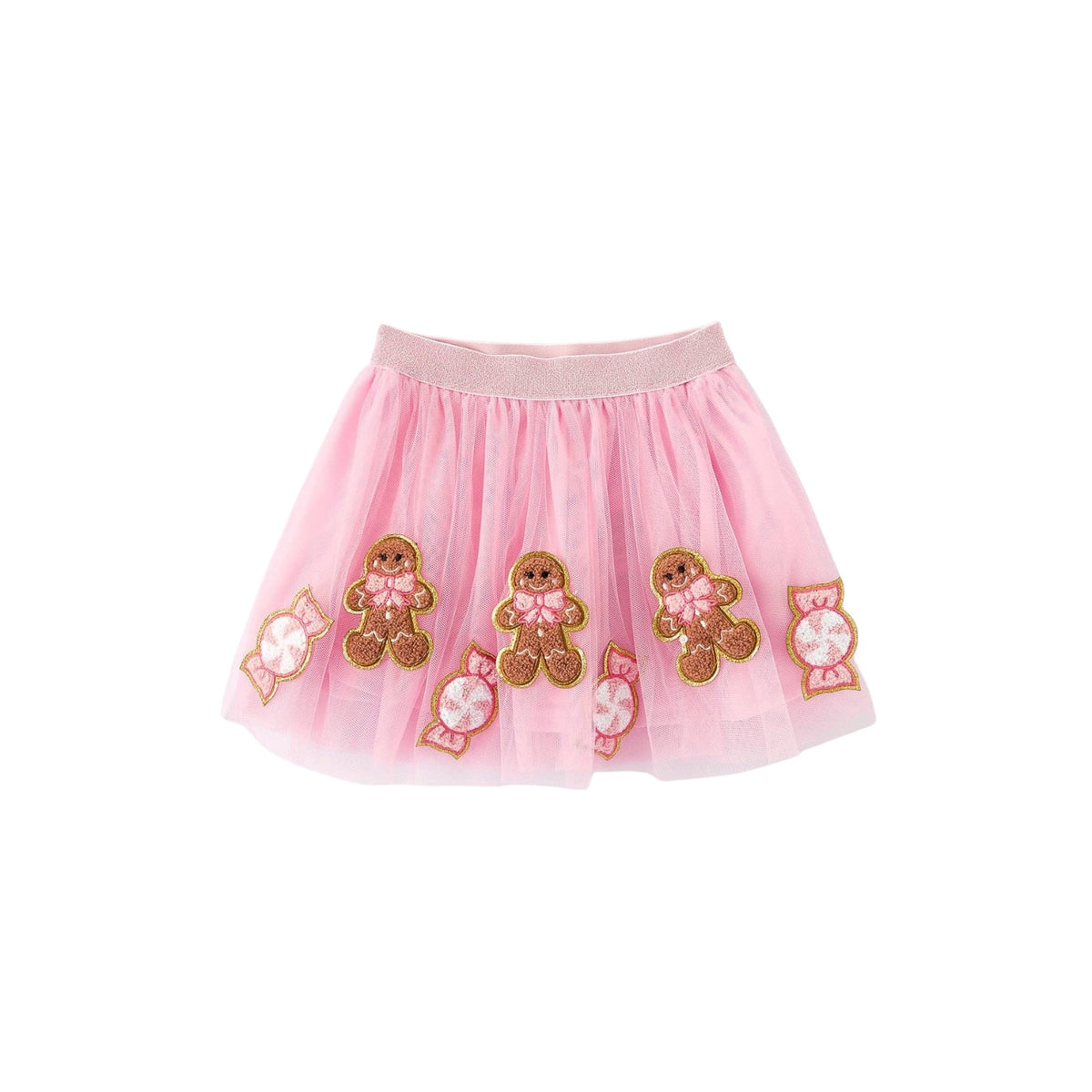 A pink tulle tutu skirt for toddlers, decorated with embroidered gingerbread men and candy motifs on a solid white background.