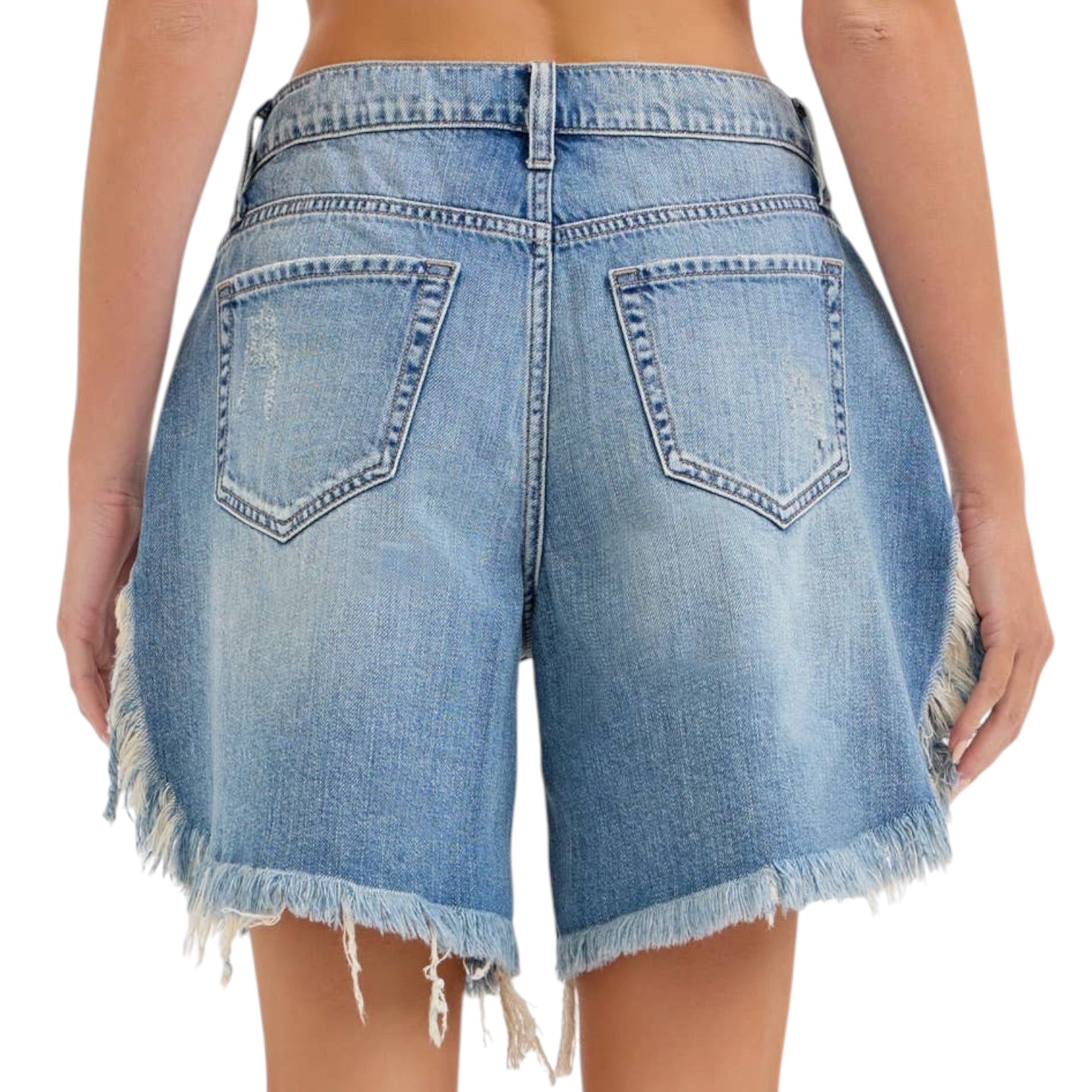 Blue denim shorts with frayed edges on a white background