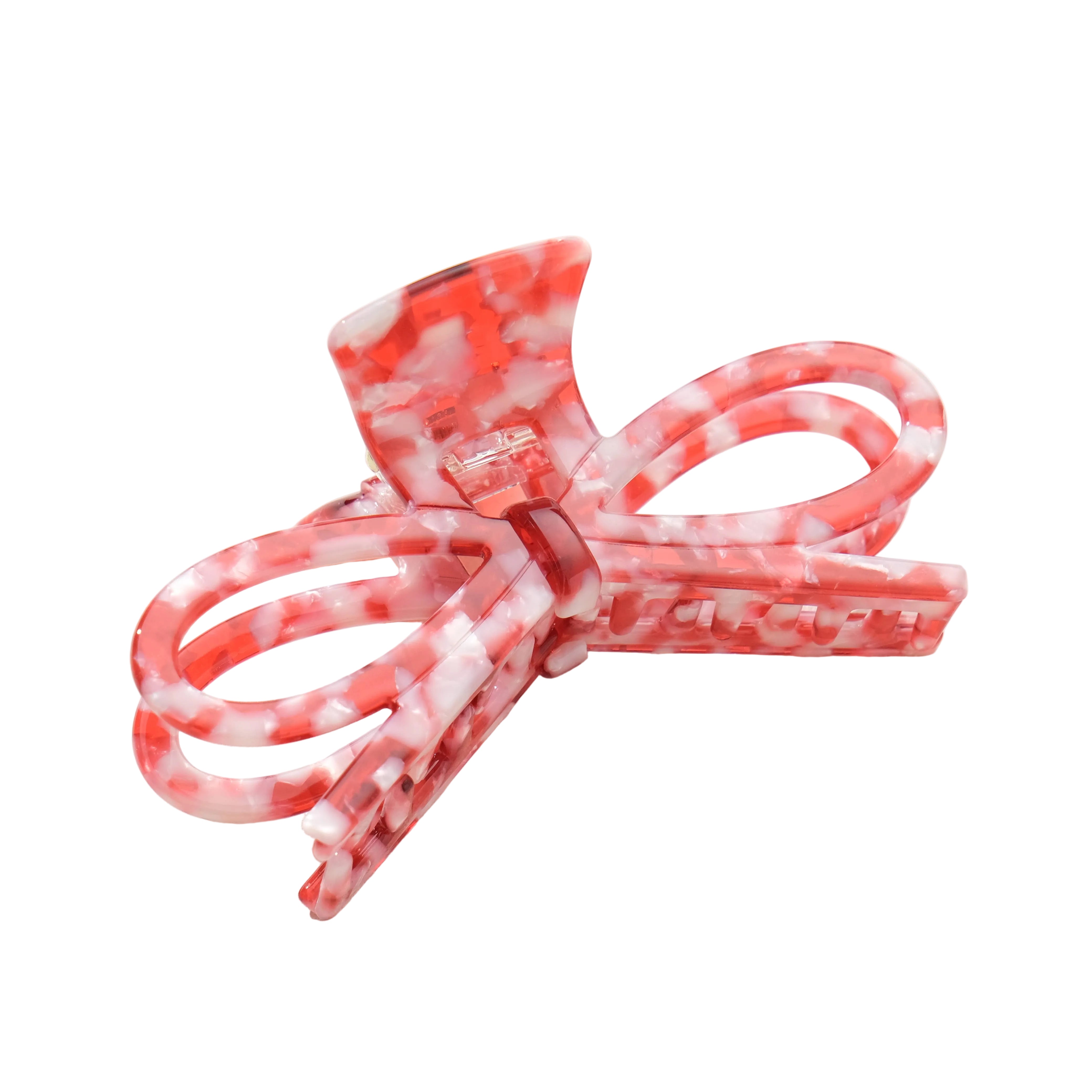 Three pink hair accessories with bow designs on a white background