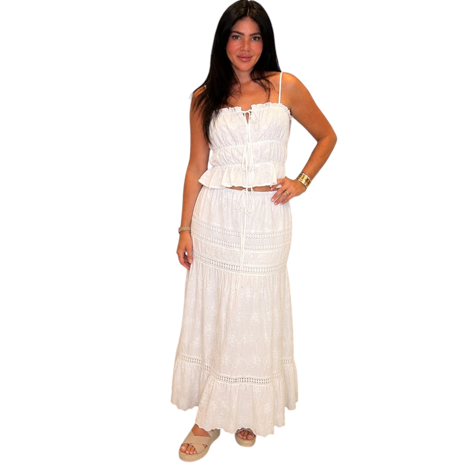 Woman wearing a white dress on a white background