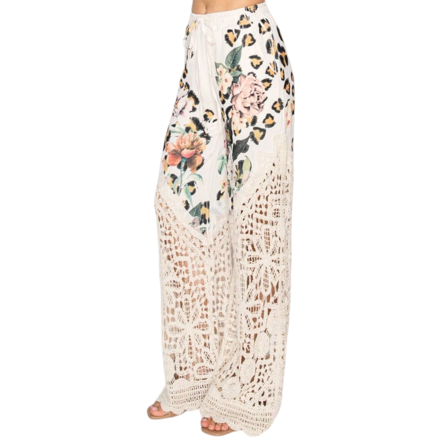 Floral and leopard print pants on a white background