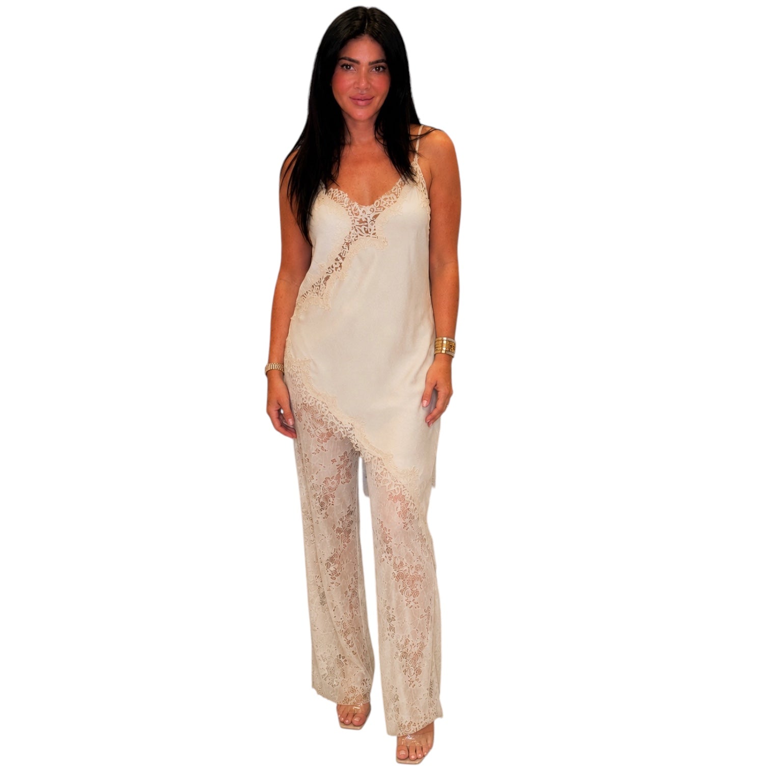 Woman wearing a beige lace set on a white background