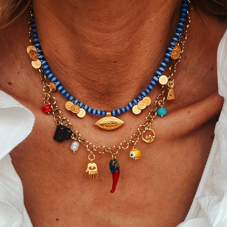 Multi charm summer necklace with blue beads, goldplated copper, and colorful charms, perfect for summer fashion.