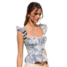 French Bloom Ruffle Corset Top available at Alicia DiMichele Boutique – stylish women’s fashion and accessories.