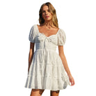 Sunday Whispers Eyelet Mini Dress available at Alicia DiMichele Boutique – stylish women’s fashion and accessories.