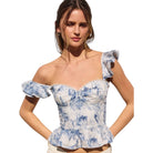 French Bloom Ruffle Corset Top available at Alicia DiMichele Boutique – stylish women’s fashion and accessories.