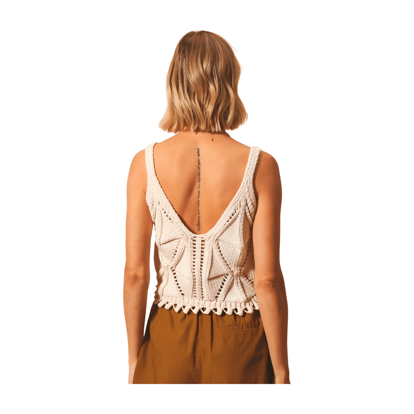 Back view of an artisan knit tank in oatmeal featuring a deep V-neckline and playful fringed hem.