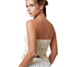 Model wearing a Crochet Flyaway Tube Top showcasing intricate crochet details and a modern flyaway cut.
