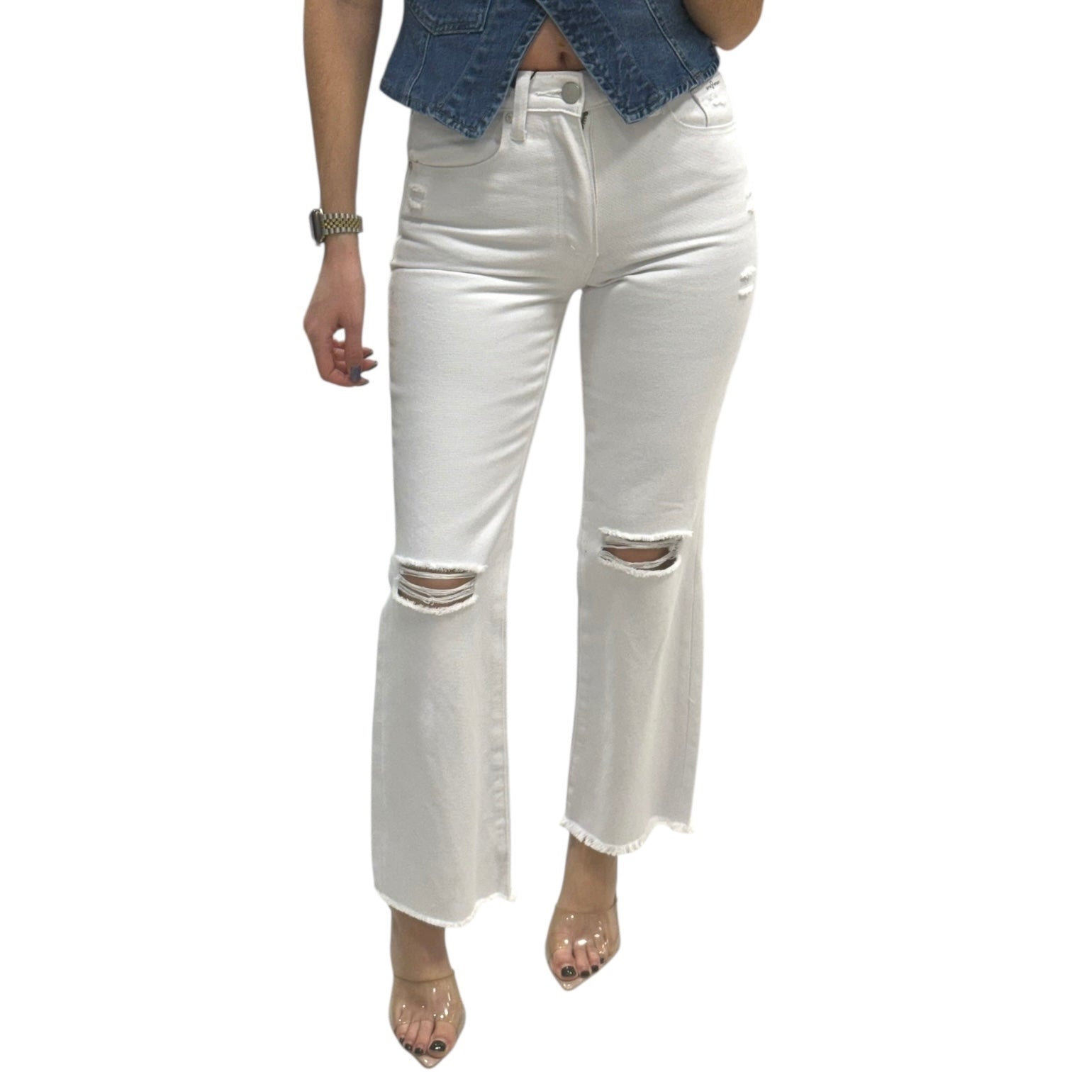 White distressed jeans worn by a person on a white background