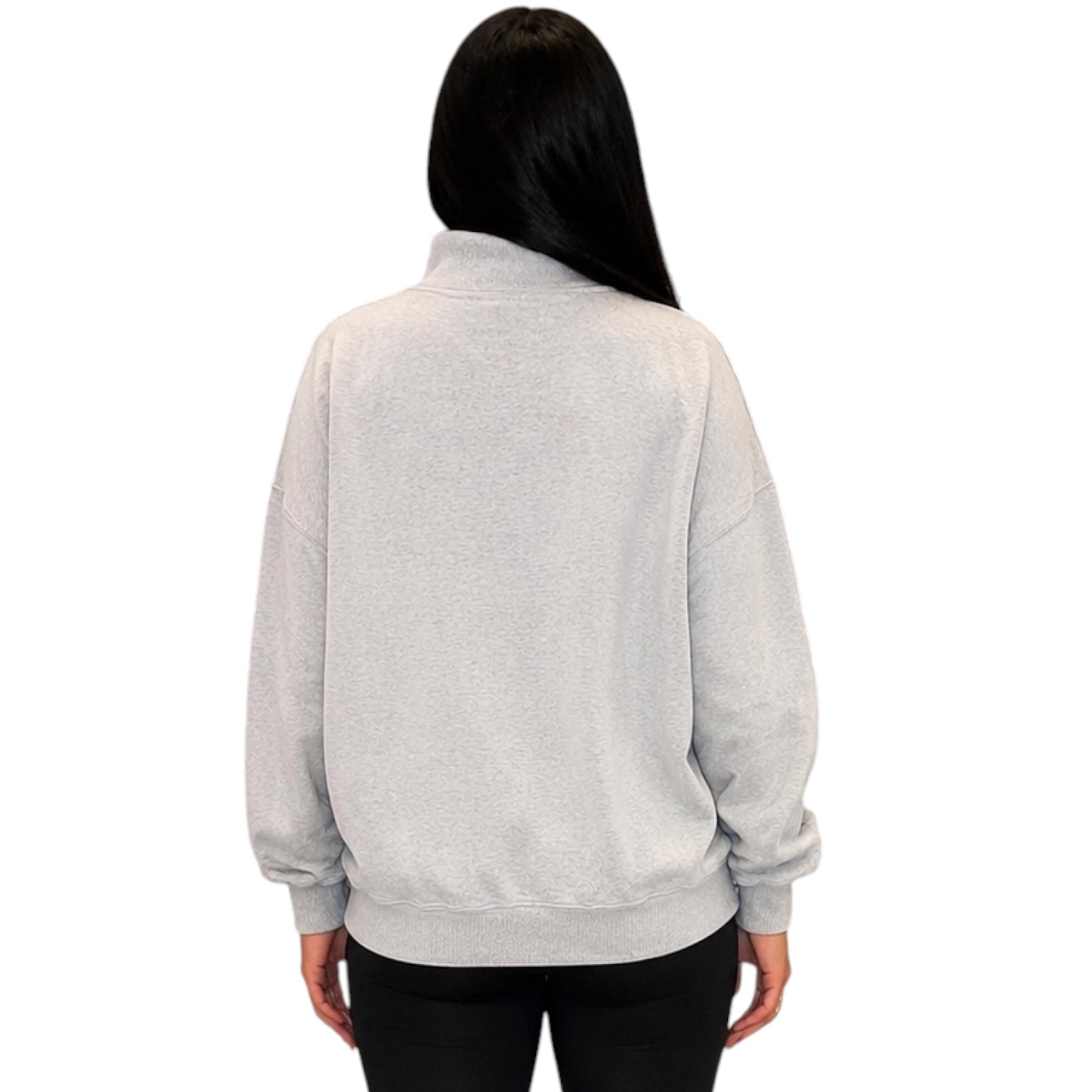 A person shown from the back wearing a light heather gray sweatshirt and black pants against a plain white background.