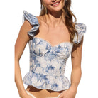 French Bloom Ruffle Corset Top available at Alicia DiMichele Boutique – stylish women’s fashion and accessories.