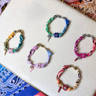 Give 'Em The Horn Bandana Bracelets available at Alicia DiMichele Boutique – stylish women’s fashion and accessories.