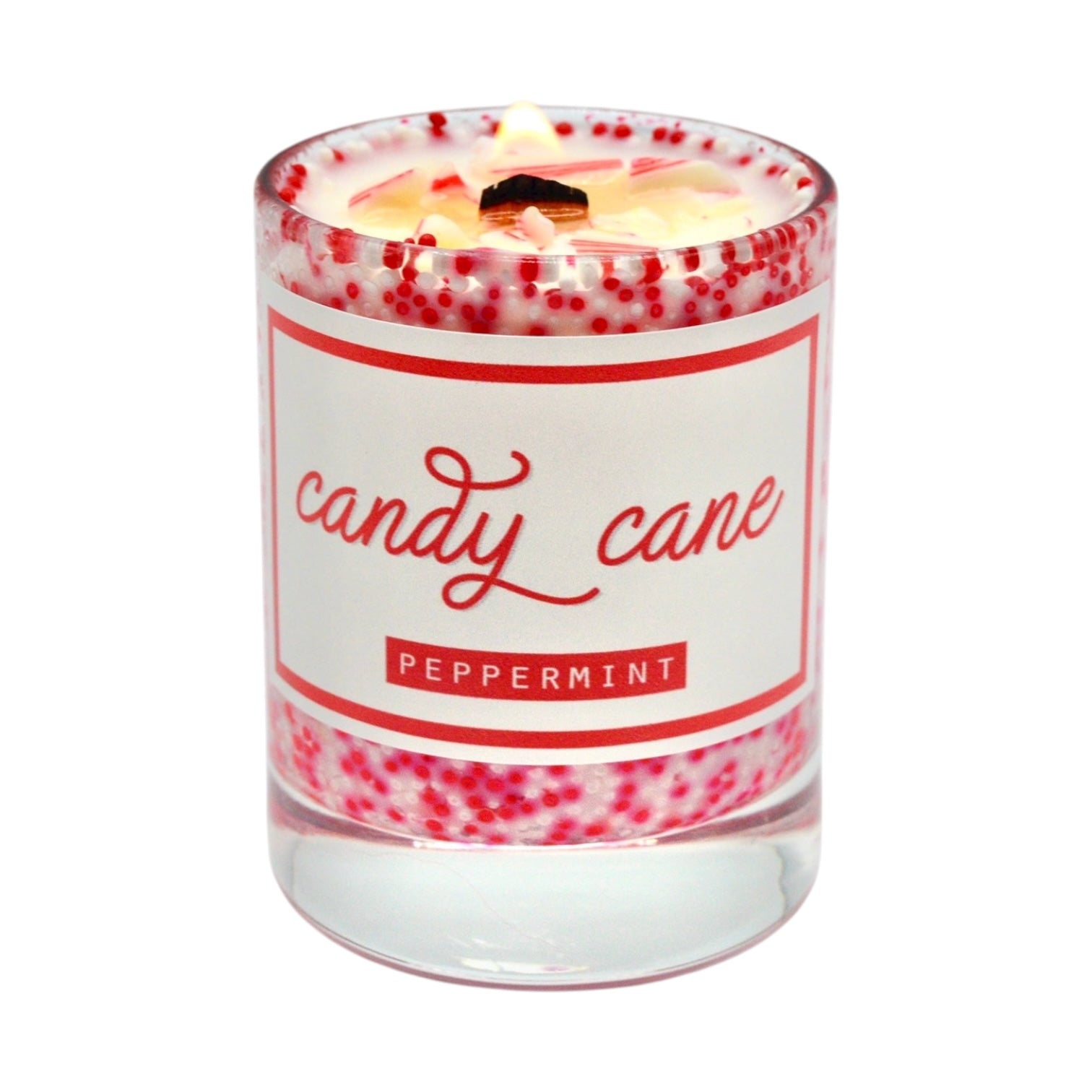 Candle with a candy cane design and 'candy cane peppermint' label on a white background