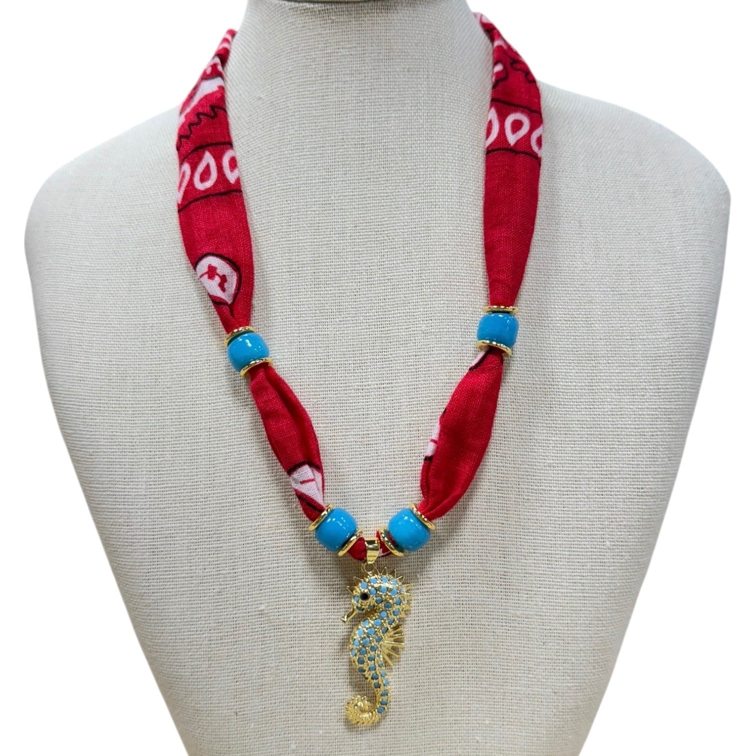 Seahorse Red Bandana Necklace available at Alicia DiMichele Boutique – stylish women’s fashion and accessories.