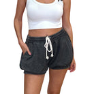 Midnight Black Bubble Shorts available at Alicia DiMichele Boutique – stylish women’s fashion and accessories.