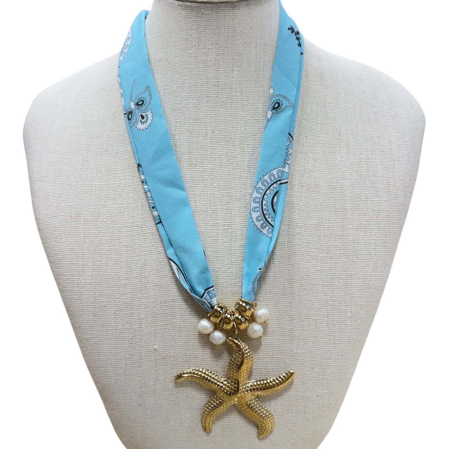 Seafoam Bandana Starfish Necklace available at Alicia DiMichele Boutique – stylish women’s fashion and accessories.
