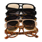 Four pairs of sunglasses with different frame designs on a white background
