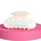 Hair clip with 'bride' text on a pink base
