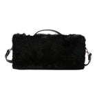 A black faux fur shoulder bag with a black leather top handle and a thin black shoulder strap, shown against a plain white background.