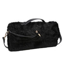 Black faux fur shoulder bag with a top handle, zippered closure, and a small gold-tone accent on a plain white background.