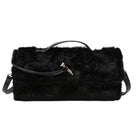 Black faux fur shoulder bag with a top handle, zippered closure, and a small gold-tone accent on a plain white background.