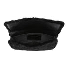 Black faux fur clutch bag shown open to display the interior, featuring a black faux leather cardholder and a black interior lining, set against a plain white background.