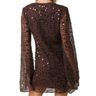 Brown dress with sequin detailing on a white background