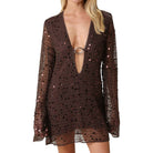 Brown sequin dress with long sleeves on a white background