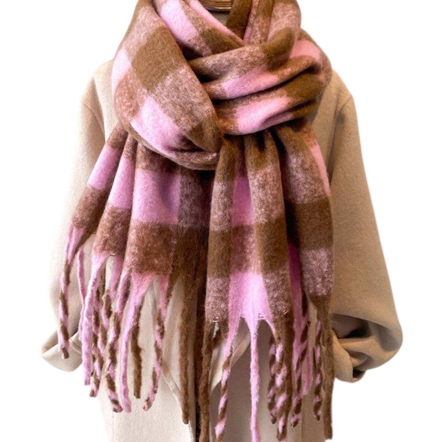 Plaid scarf with pink and brown colors draped over a beige sweater on a white background