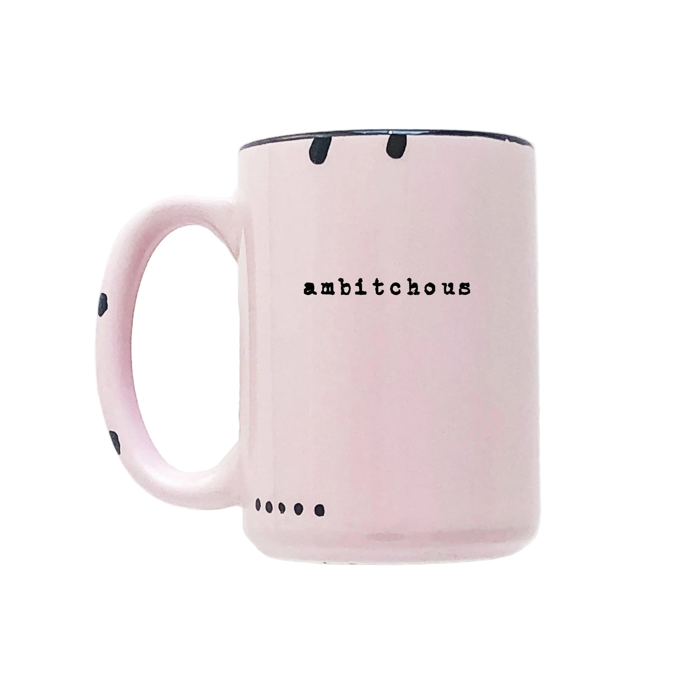 Pink mug with 'ambitious' text on a white background