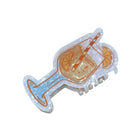 Decorative hair clip with a drink design on a white background