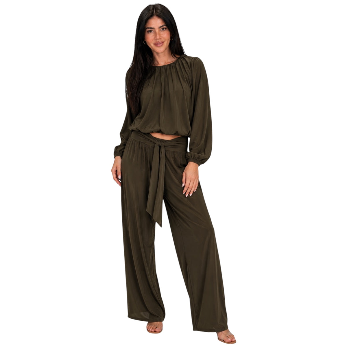 A woman modeling a matching two-piece lounge set in olive green, featuring a long-sleeve cropped top with a gathered neckline and wide-leg pants with a tie waist, set against a plain white background.