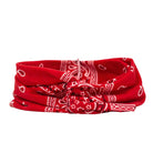 Red bandana with white patterns on a white background